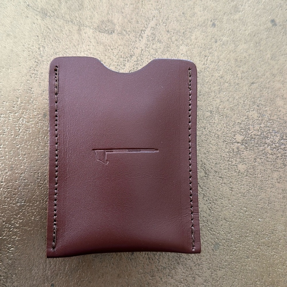 NEW men’s Strong Leather $ clip for cards and $$ has a golf club logo & in box.